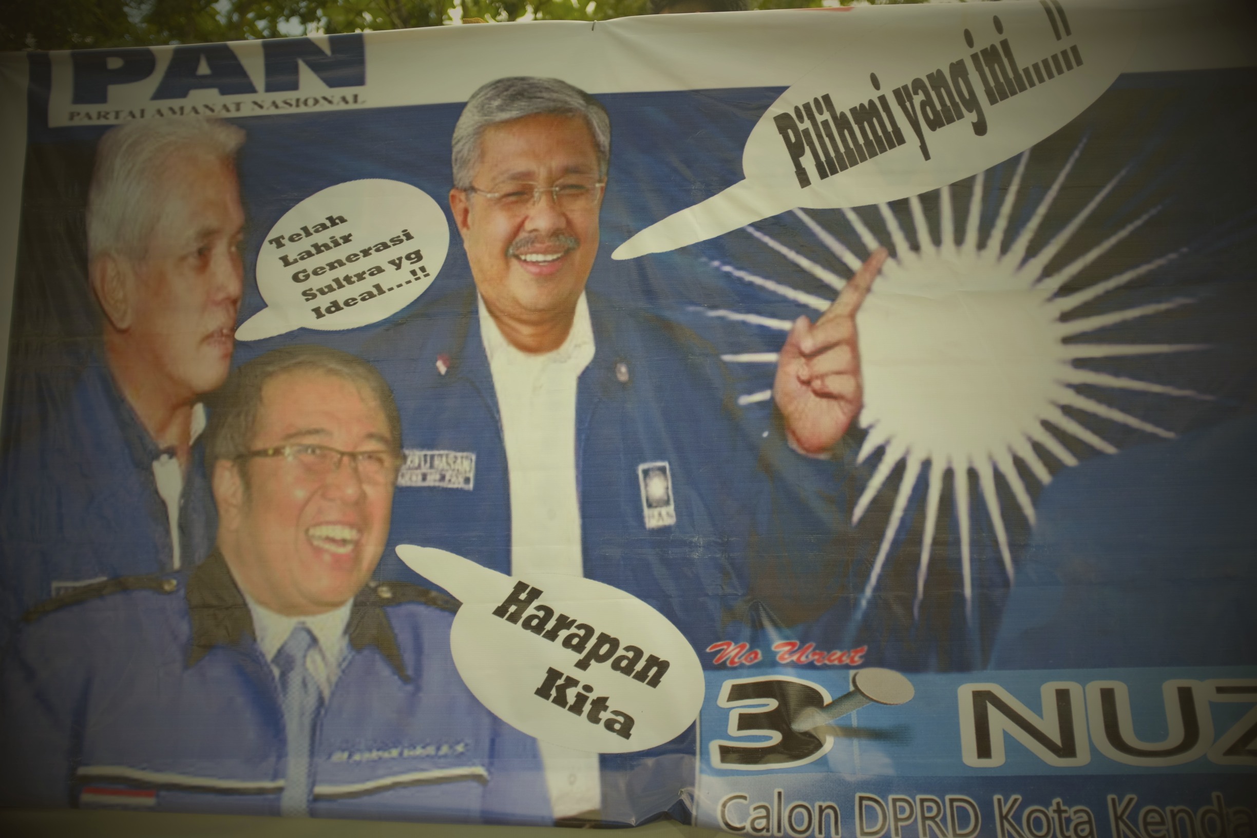 Campaign from April's legislative elections in Southeast Sulawesi, featuring Hatta Rajasa, Governor Nur Alam, and the Mayor of Kendari, Asrul- author's collection Warburton Hatta Nur Alam and Kendari Mayor Asrun Author Photo